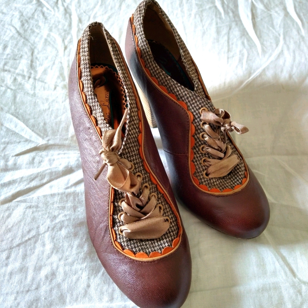 Poetic license Anthropologie lace up heels booties
